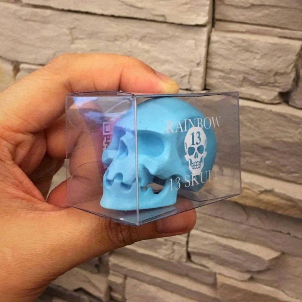 Rainbow Skulls By 13Art Skullman in hand blue